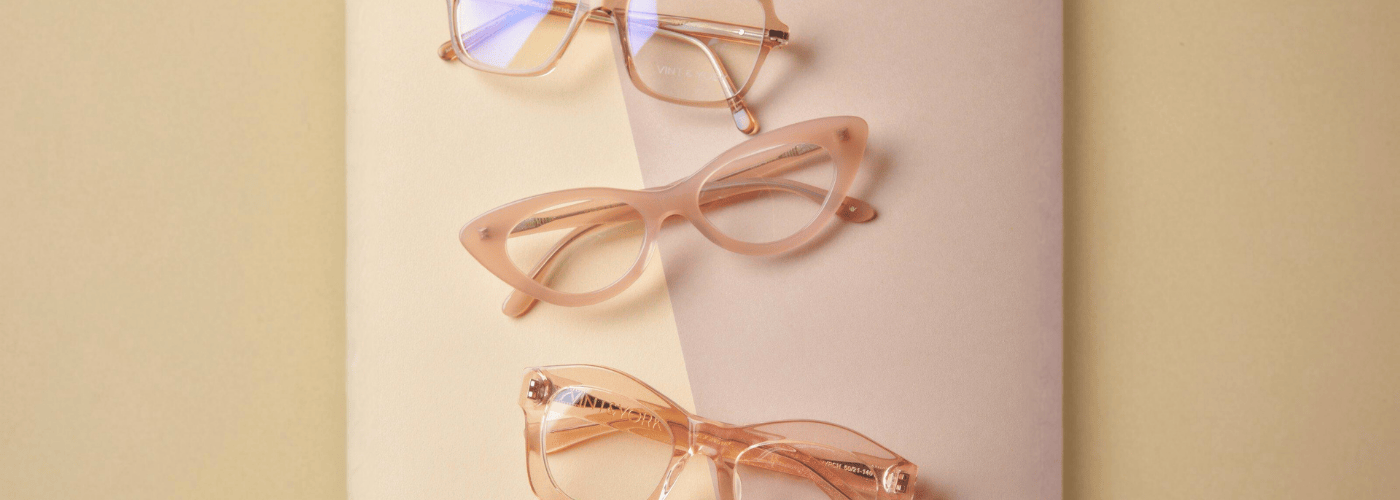 Flatlay lifestyle image showcases trendy eyeglasses for women